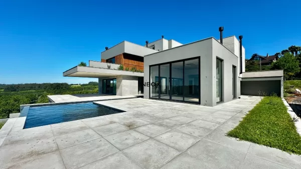 Foto de INBOX CIA IMOBILIÁRIA VENDE - CASA COM 4 SUITES NO VALE DOS VINHEDOS.