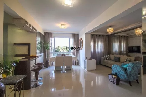 Foto de Apartamento com 2 dormitórios, suíte e vaga de garagem no Passo d Areia Poa RS